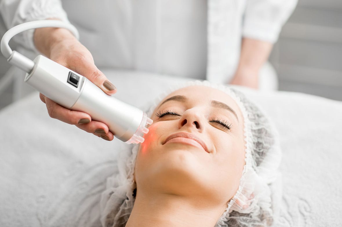 woman getting an anti-aging facial treatment in NYC