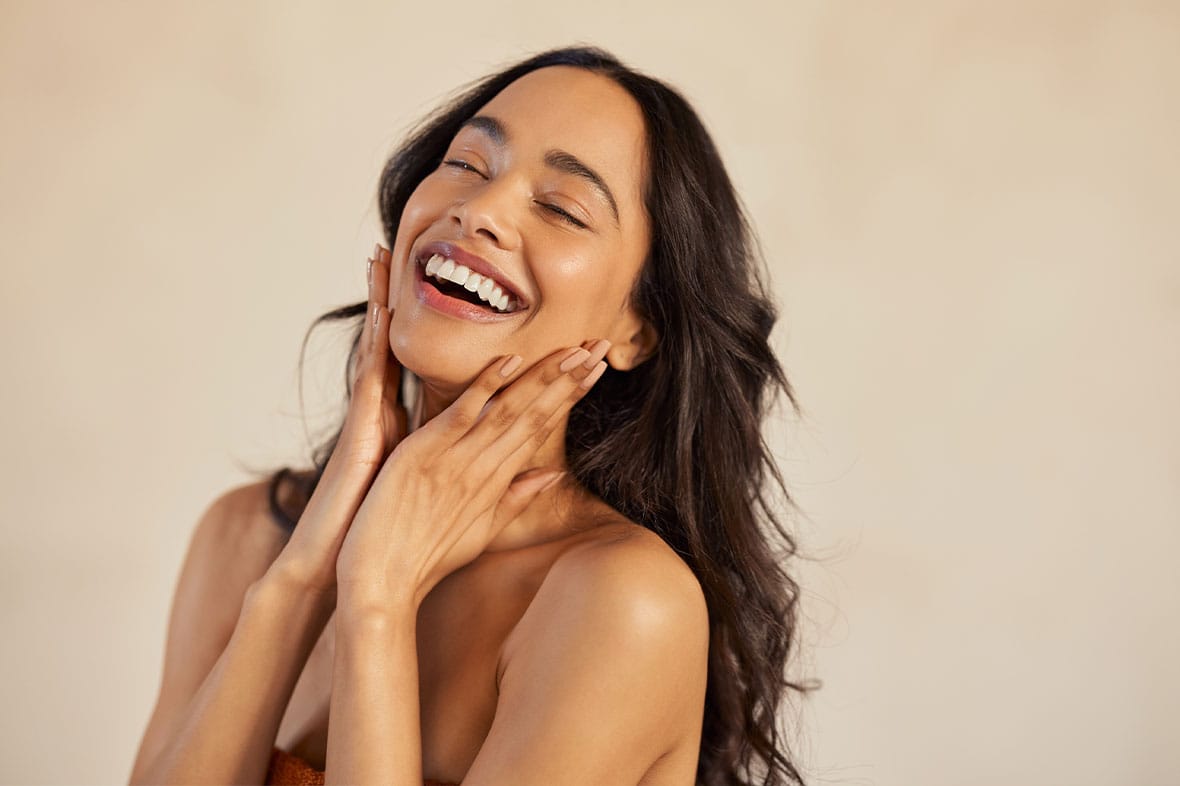 woman happy after getting a deep plane facelift in NYC