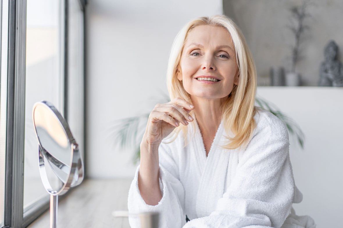 older woman happy after her chemical peel in NYC