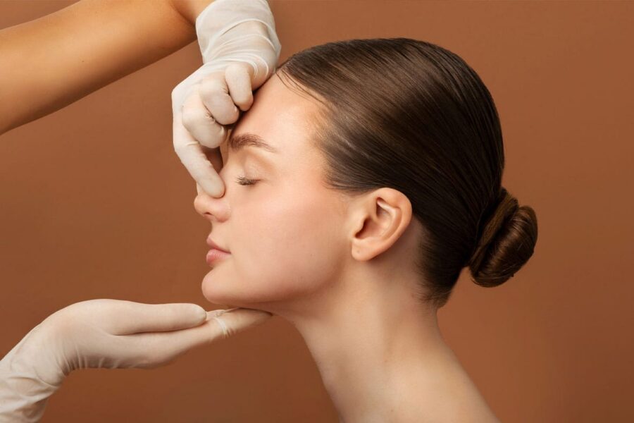 woman after getting a closed rhinoplasty in NYC