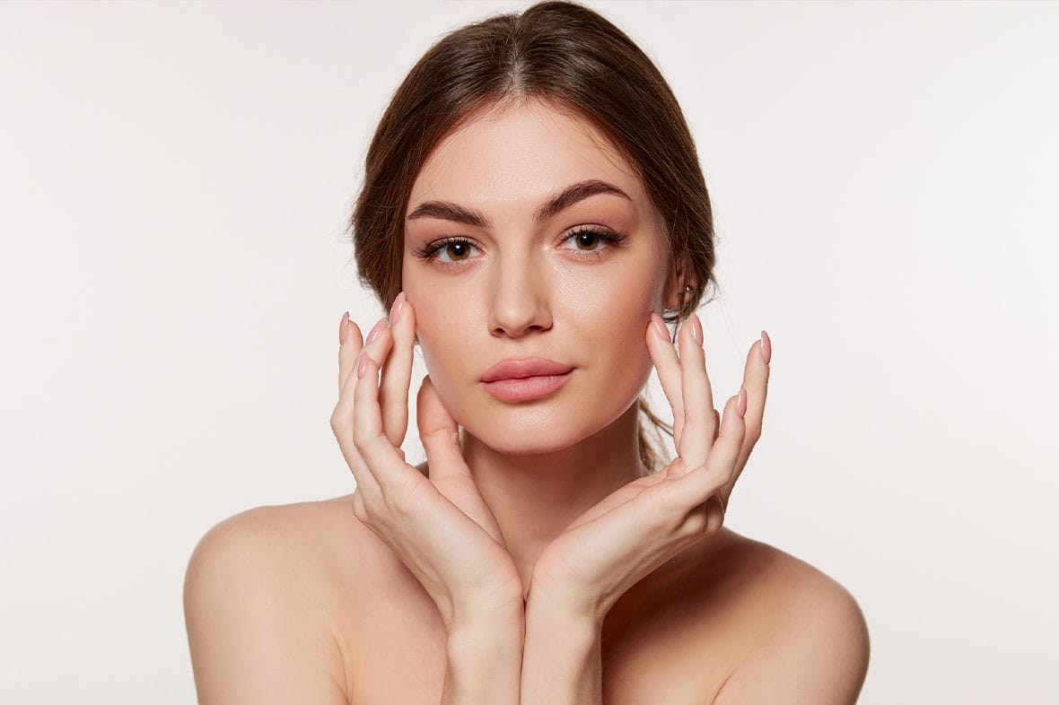 woman after getting facial fat grafting in NYC