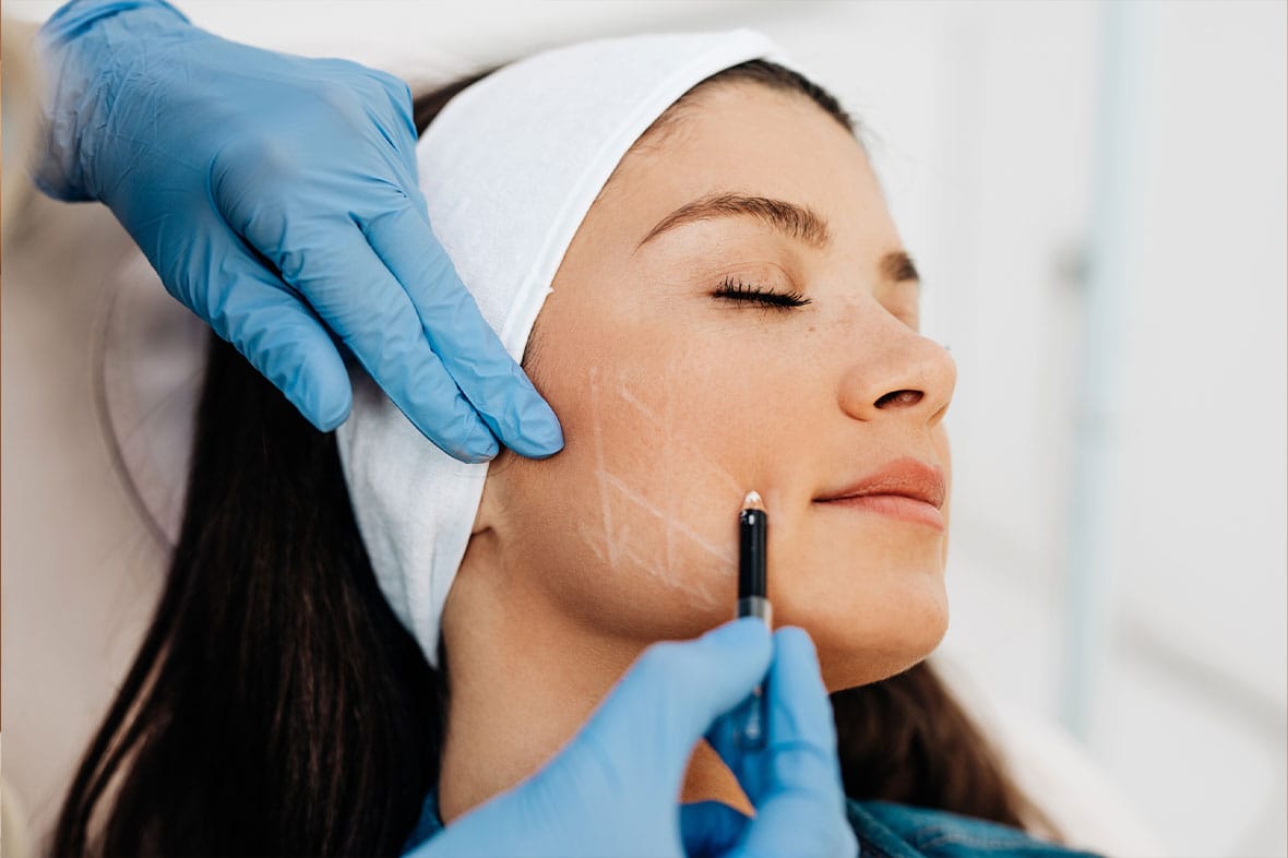 woman having a facial fat grafting consultation in NYC