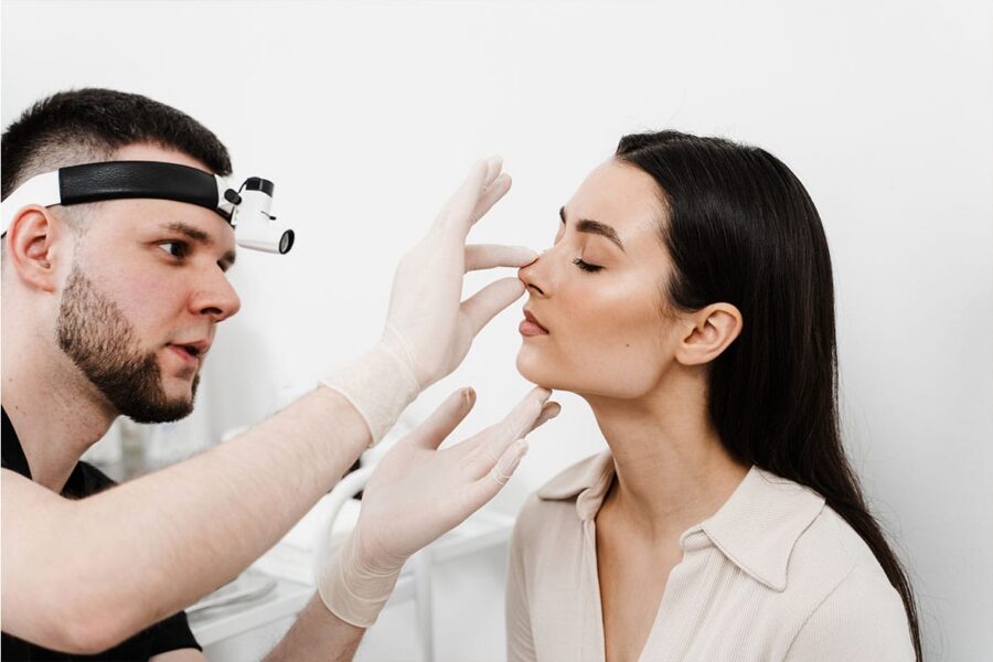woman having a consultation for a preservation rhinoplasty in NYC