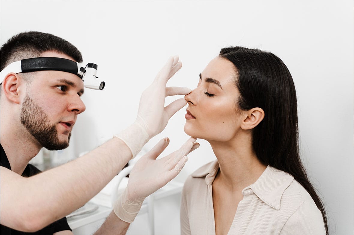 woman having a consultation for a preservation rhinoplasty in NYC
