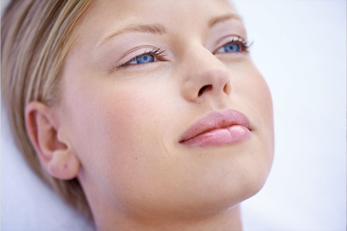 woman after her preservation rhinoplasty in NYC